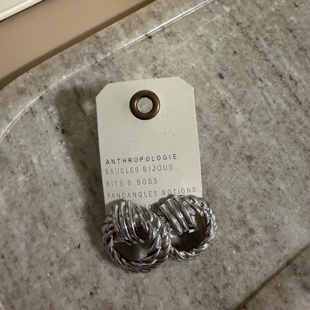 Anthropologie Shiny Silver Twisted Knot Hoop Earrings